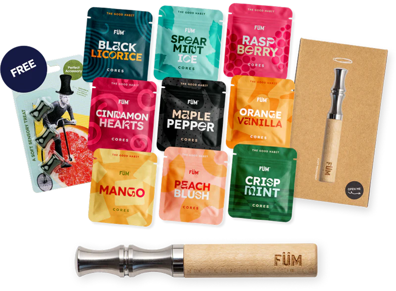 Assorted vaping product packages with flavors and a wooden device on a white background